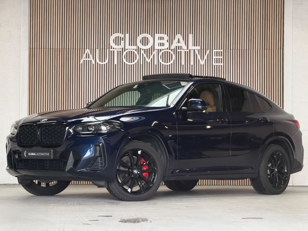 BMW X4 XDrive30i High Executive M Sport - M Stoelen - Panoramadak - Tansanitblau 57679248-0.jpg | Global Automotive